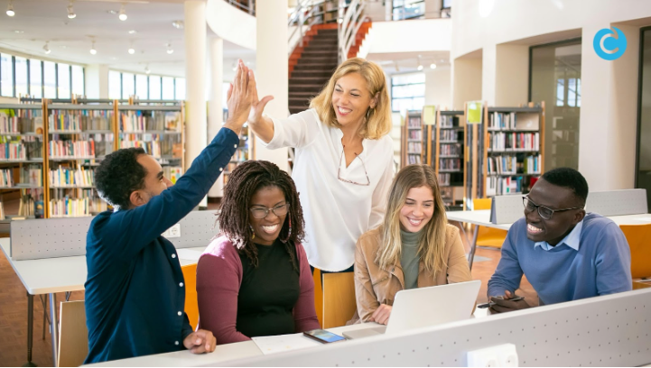 A group of teachers celebrating increased comprehension of their students