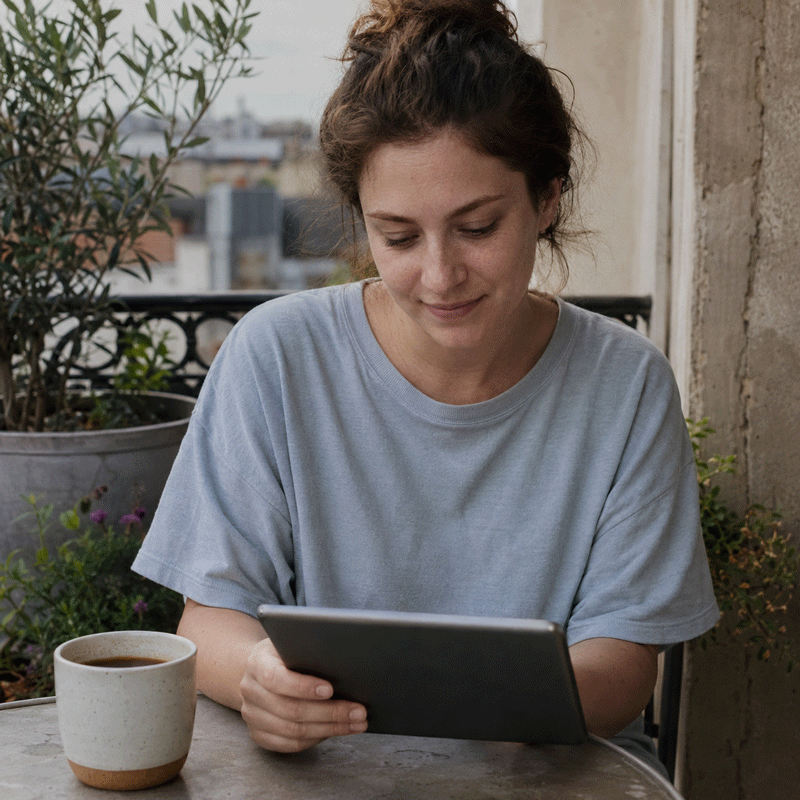 A person reading on a tablet